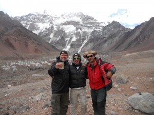 With Hew and mountain guide Angel Armesto at top of the glacier Placa Francia with Aconcagua , the highest peak in the Americas behind