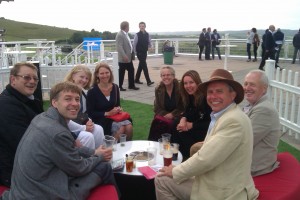The team at Goodwood Races, demonstrating how to loose money and fake a smile.