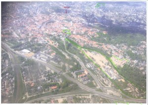 View over Vilnius from the air, shortly after take-off, through rather grubby aircraft windows. Some tfLT projects and office highlighted